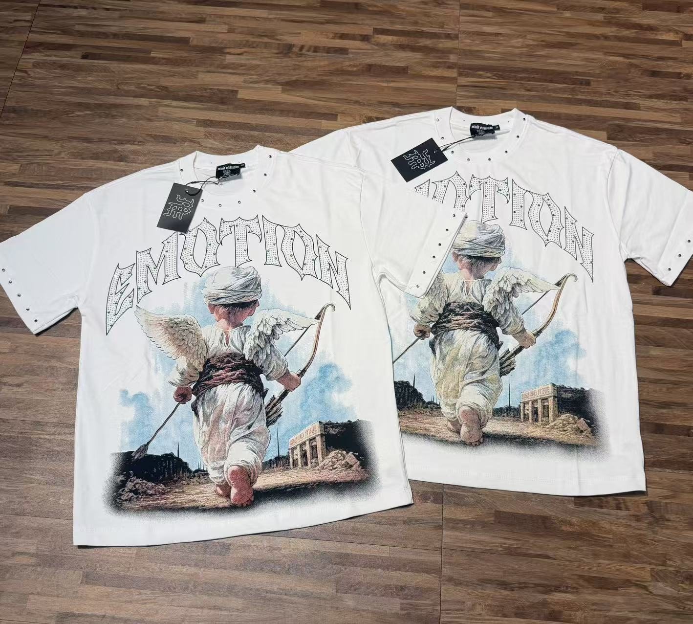 MIXED EMOTION Angel Archer Graphic T-Shirt — context